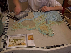 Eine Mosaikarbeit der Fliesenleger. Ein Frosch!